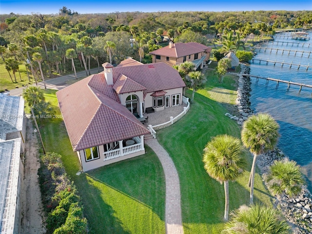 birds eye view of property featuring a water view