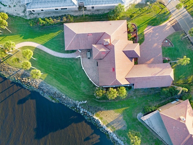 birds eye view of property featuring a water view
