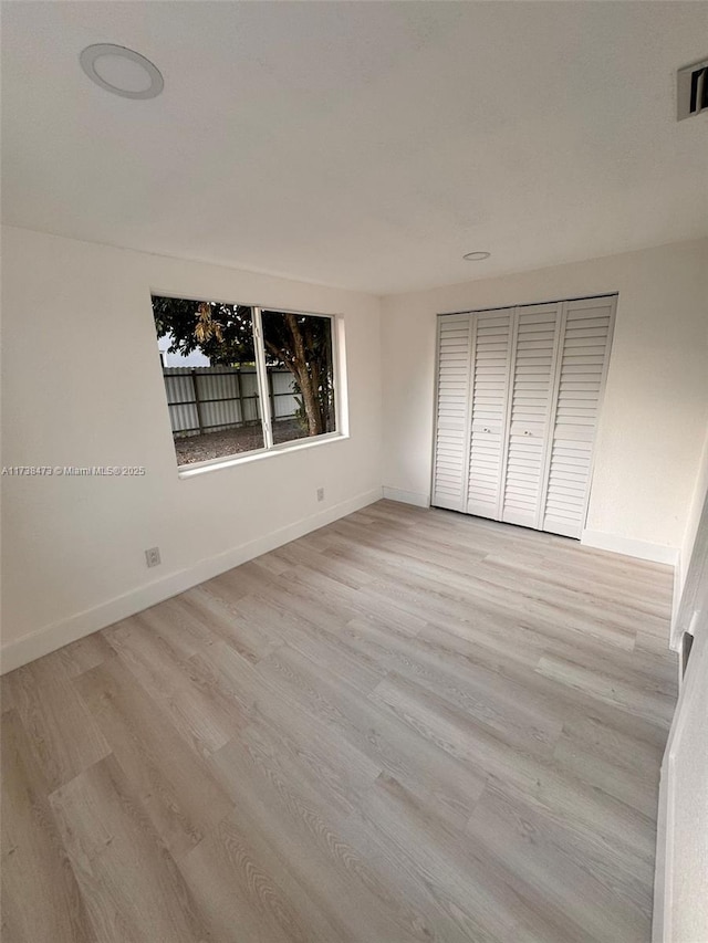 unfurnished bedroom featuring light hardwood / wood-style flooring