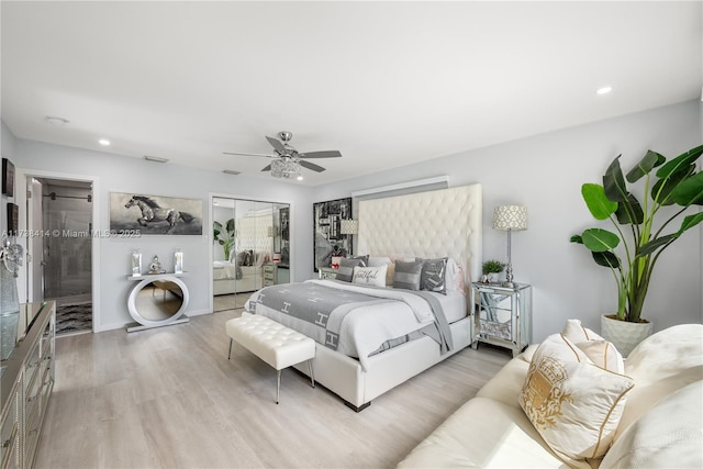 1410 S 22nd Ave, Hollywood, FL 33020 - bedroom with light wood-style flooring, recessed lighting, a closet, and ceiling fan
