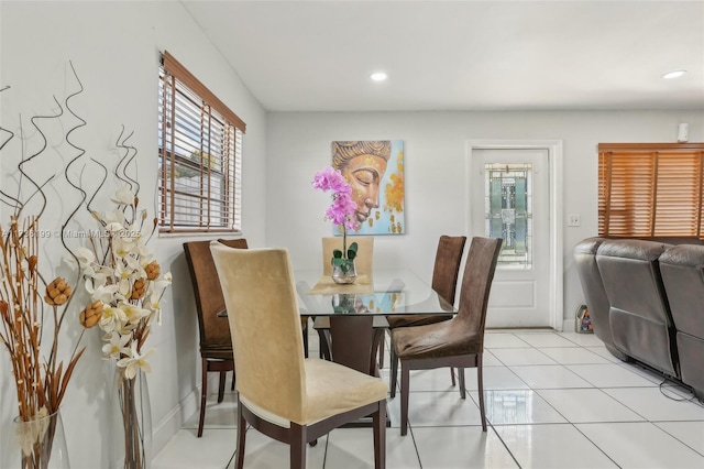 dining area with light tile patterned floors