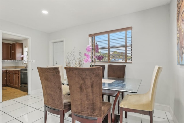 dining room featuring light tile patterned floors