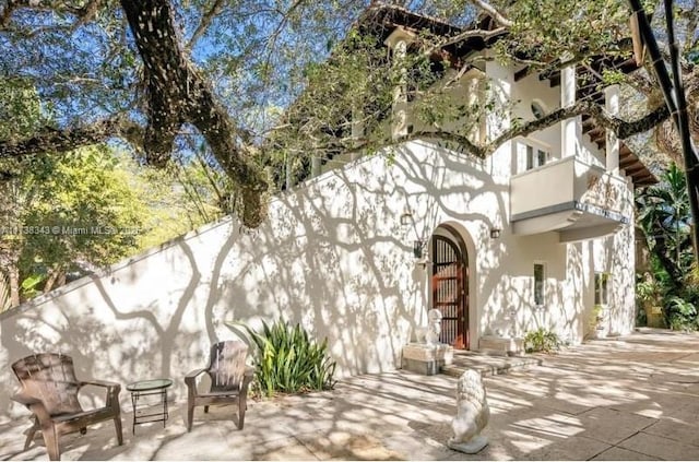4191 Lybyer Ave, Coconut Grove, FL 33133 - rear view of property with a patio area and stucco siding
