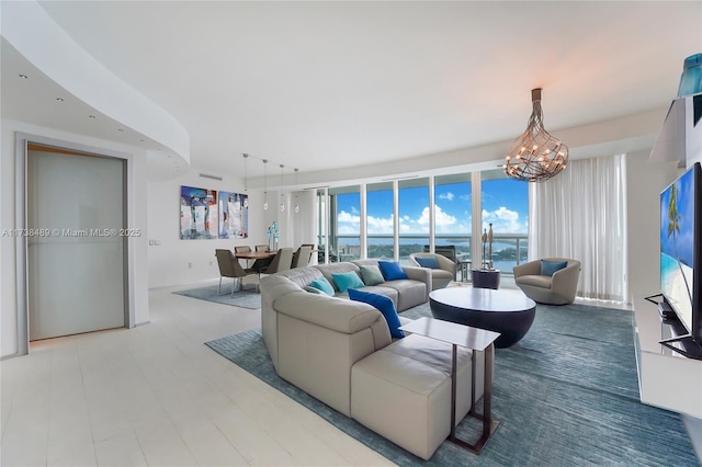 living room with a chandelier