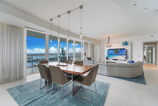 dining space with a water view