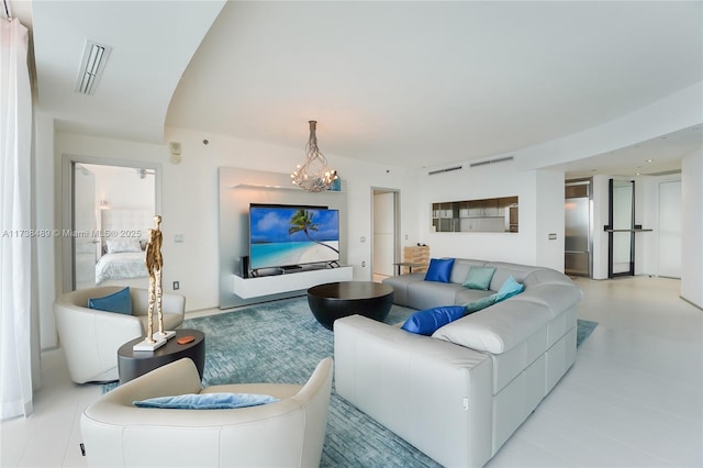 450 Alton Rd Unit 3401, Miami Beach, FL 33139 - living room featuring a chandelier