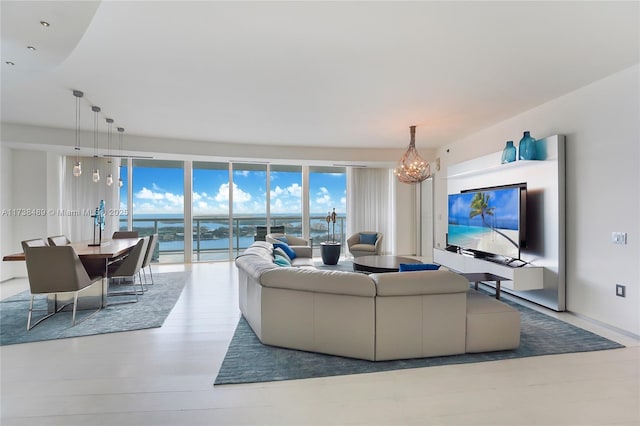 450 Alton Rd Unit 3401, Miami Beach, FL 33139 - living area with a chandelier