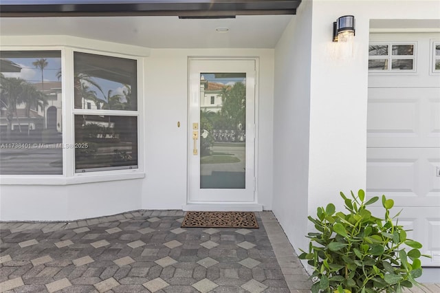 2964 NE 36th St, Lighthouse Point, FL 33064 - entrance to property with stucco siding and a garage