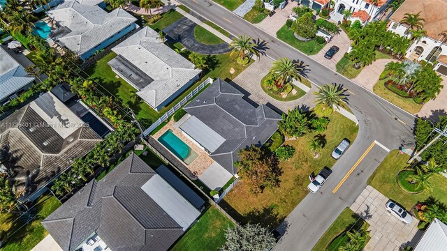 aerial perspective of suburban area with a pool