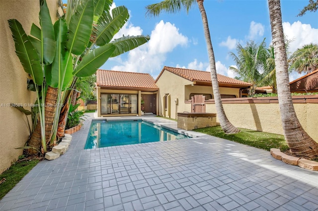 view of pool featuring a patio area