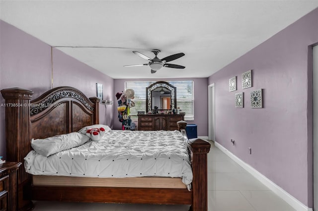 tiled bedroom with ceiling fan