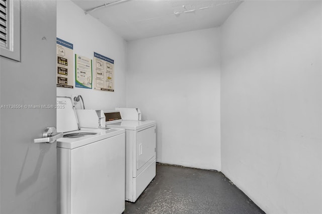 laundry room with washer and clothes dryer