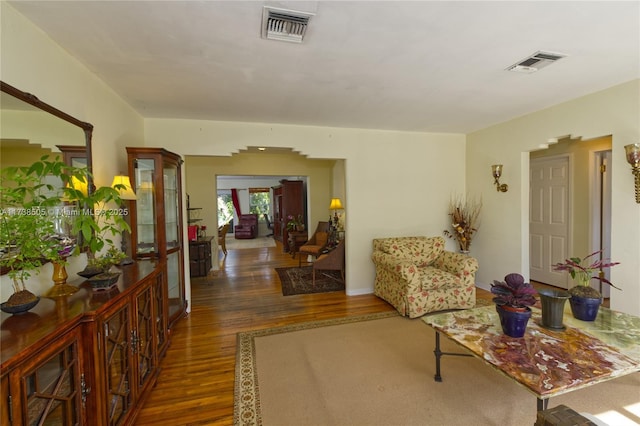 hallway with dark wood-type flooring