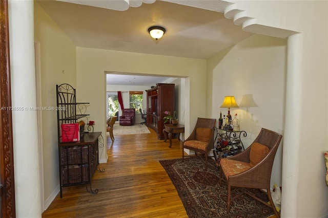 corridor featuring dark hardwood / wood-style floors