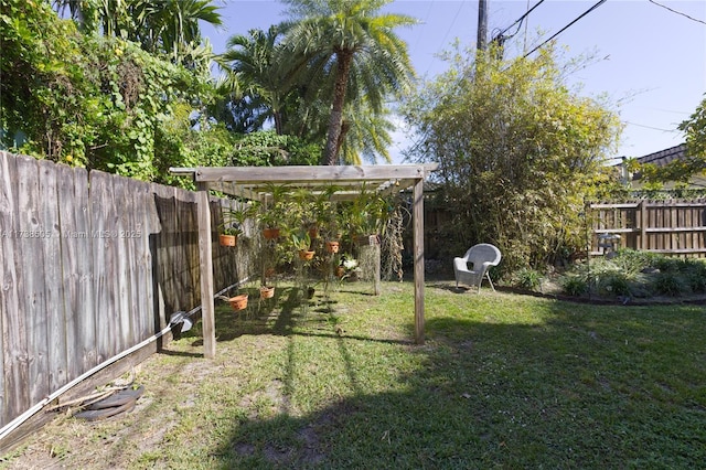 view of yard with a pergola