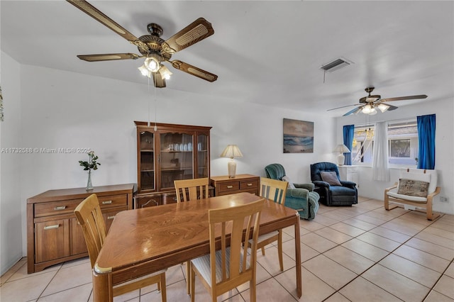 2300 Jackson St Unit 10, Hollywood, FL 33020 - tiled dining area featuring ceiling fan