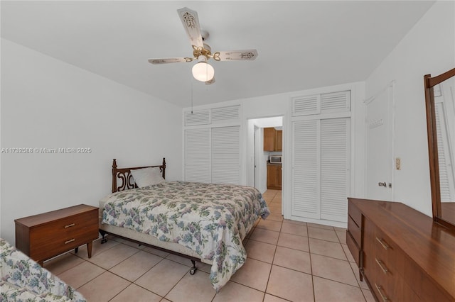 2300 Jackson St Unit 10, Hollywood, FL 33020 - bedroom featuring light tile patterned floors and ceiling fan