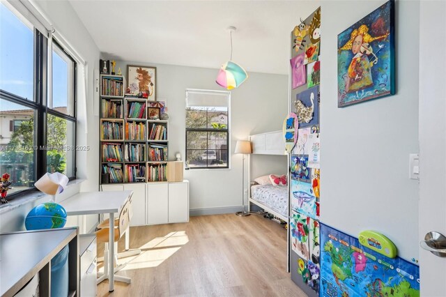 bedroom with light hardwood / wood-style flooring