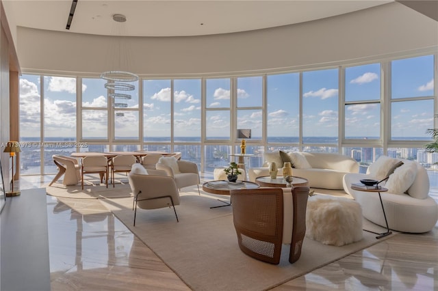 sunroom with a water view