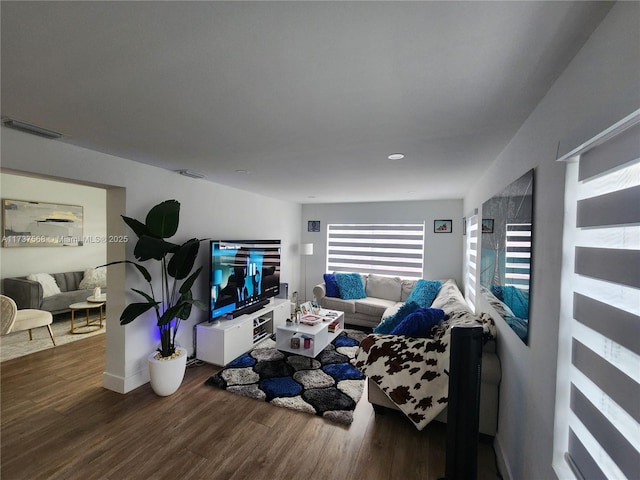 living room featuring dark hardwood / wood-style floors