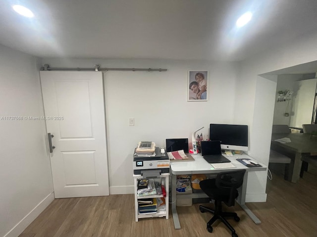 office area with hardwood / wood-style flooring