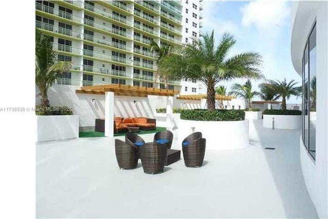 exterior space featuring a pergola and a patio