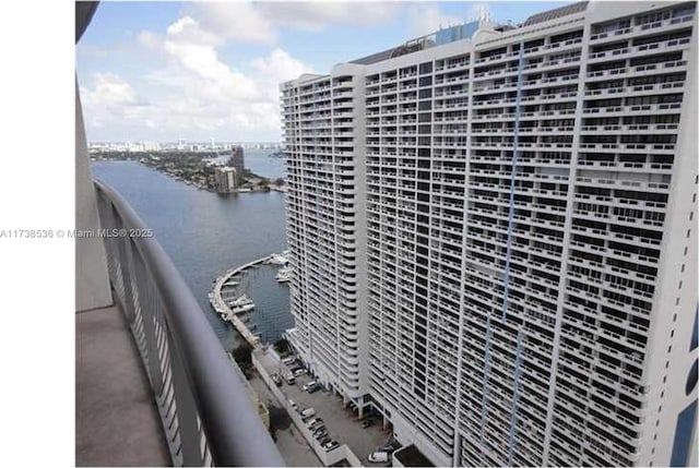 view of building exterior featuring a water view