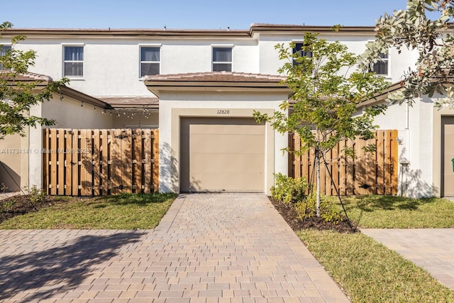 view of front of property with a garage