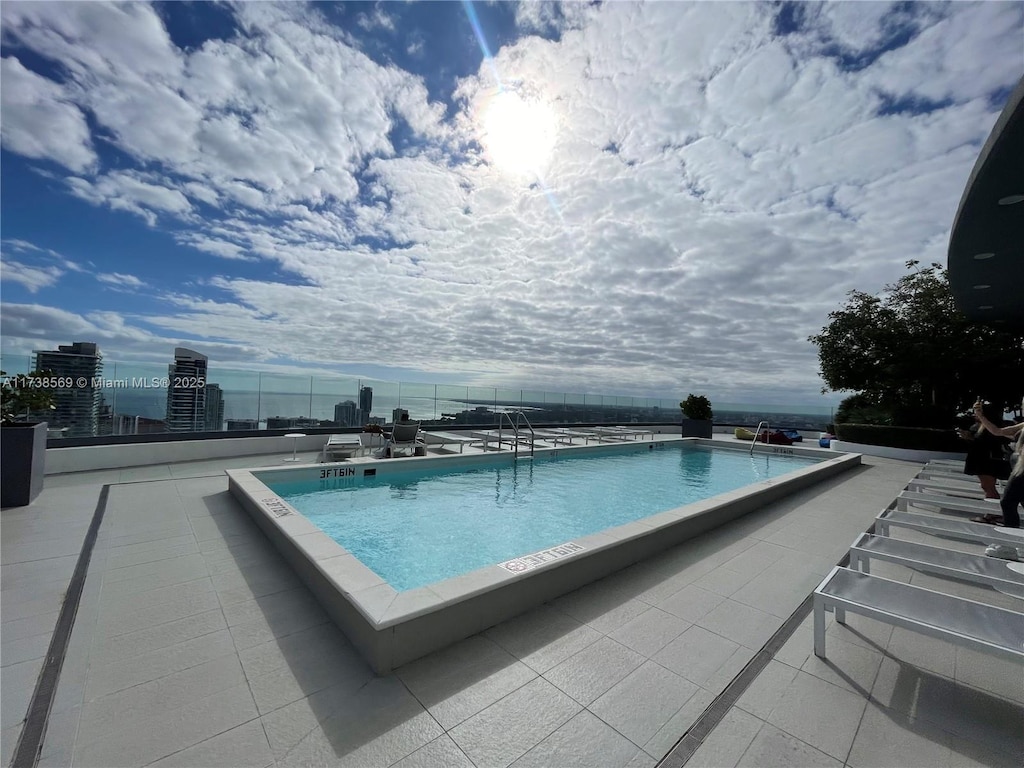 view of pool with a patio area