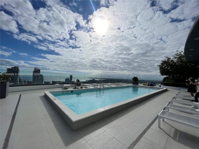 view of pool with a patio area