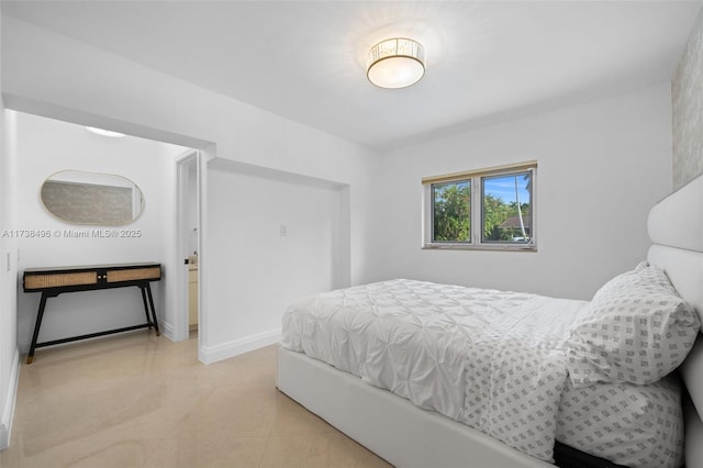 bedroom with light tile patterned flooring