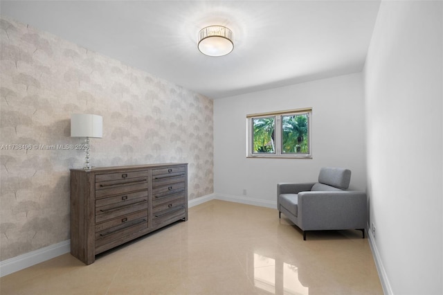 sitting room featuring light tile patterned floors