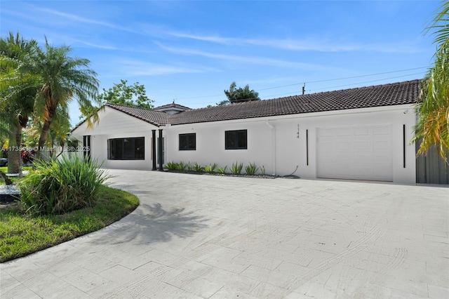 view of front of property featuring a garage