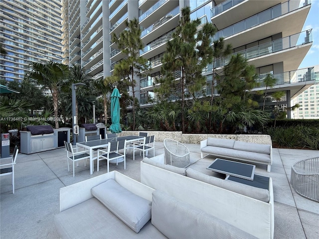 view of patio / terrace featuring grilling area and an outdoor hangout area