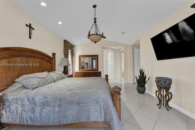 tiled bedroom with lofted ceiling