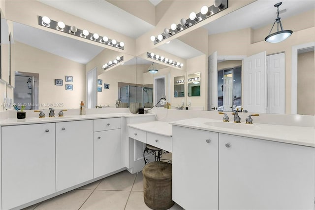 bathroom featuring tile patterned flooring, vanity, lofted ceiling, and walk in shower