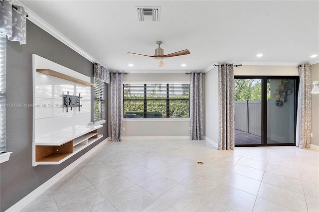 interior space with ornamental molding, a healthy amount of sunlight, and ceiling fan