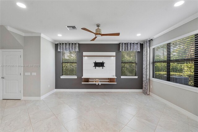 tiled spare room with ornamental molding and ceiling fan