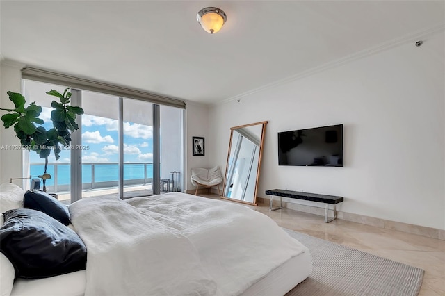 bedroom with expansive windows, crown molding, and access to outside