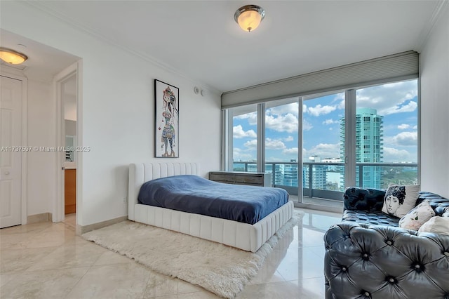 bedroom with multiple windows, crown molding, and a wall of windows