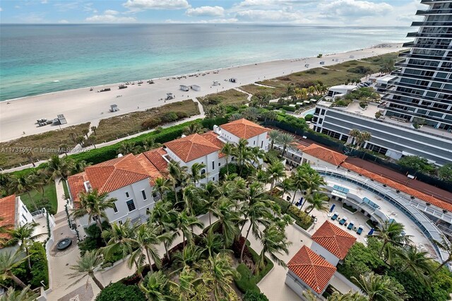 bird's eye view featuring a water view and a view of the beach