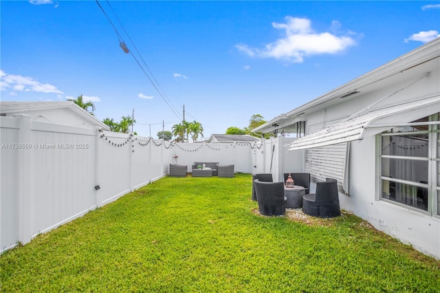 2701 NW 52nd Ct, Tamarac, FL 33309 - view of yard featuring outdoor lounge area