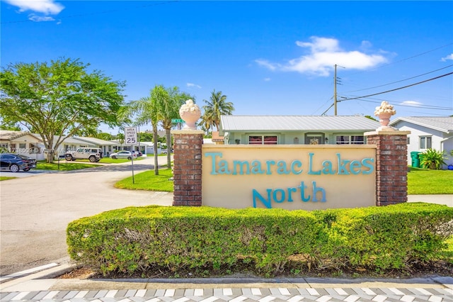 2701 NW 52nd Ct, Tamarac, FL 33309 - community sign featuring a residential view