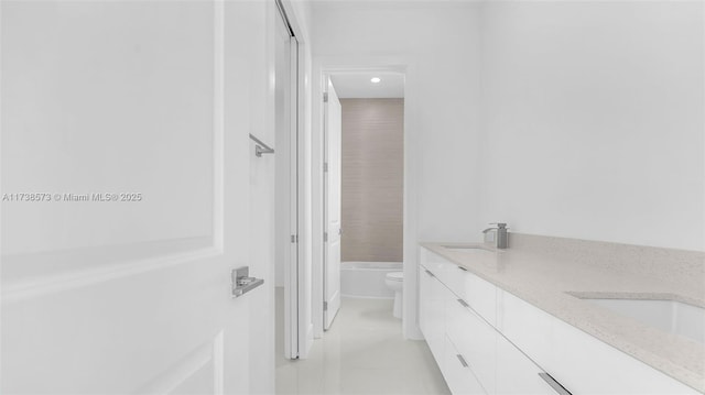 full bathroom featuring vanity, tile patterned flooring, tub / shower combination, and toilet