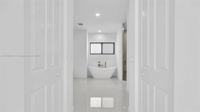 bathroom with a bath