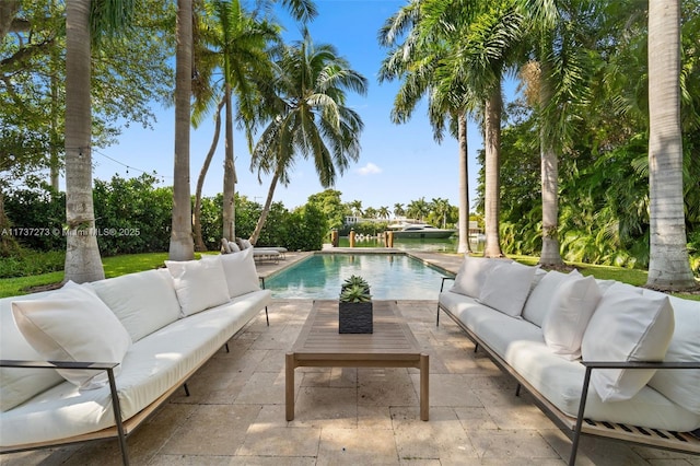 view of swimming pool featuring outdoor lounge area and a patio area