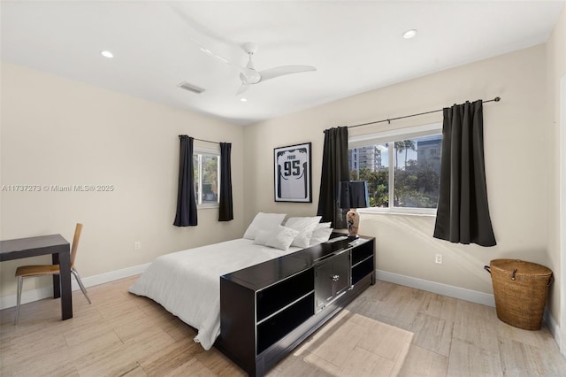 bedroom featuring ceiling fan and light hardwood / wood-style floors