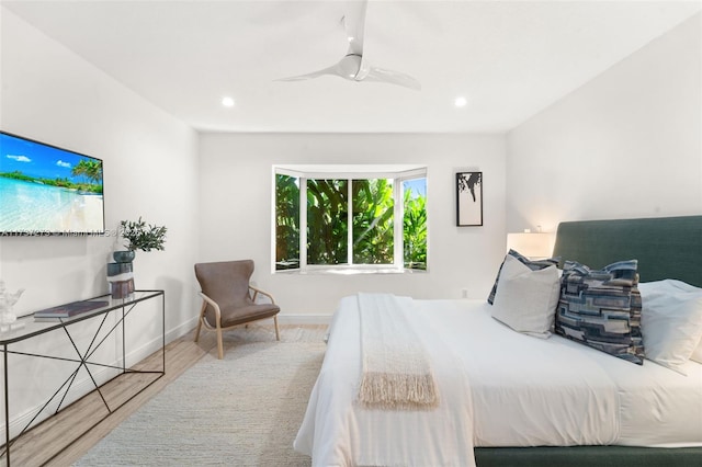 bedroom featuring hardwood / wood-style floors and ceiling fan