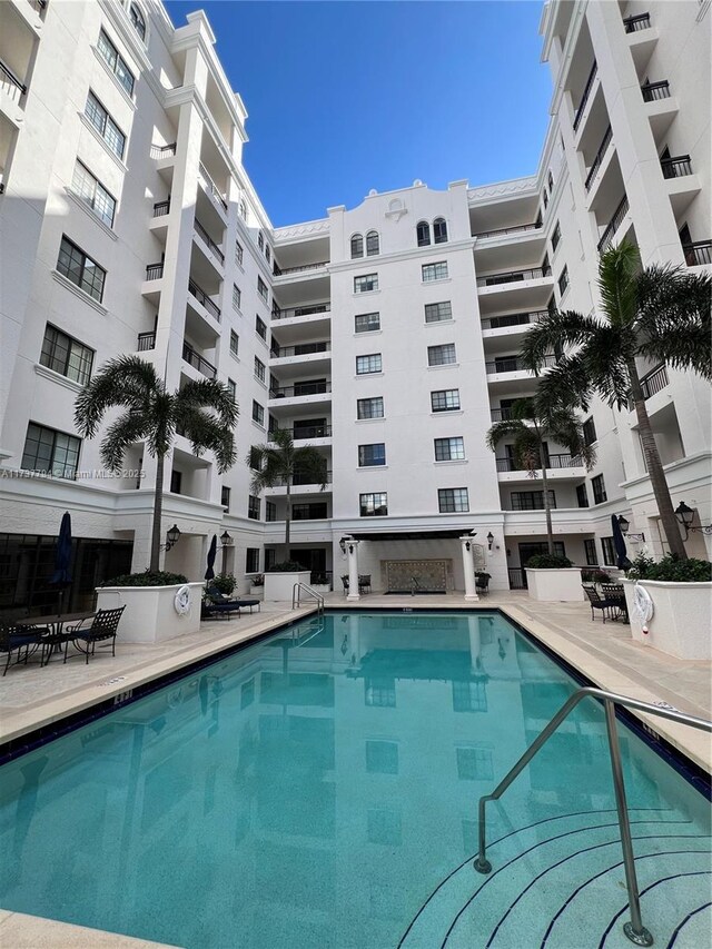 view of pool featuring a patio area