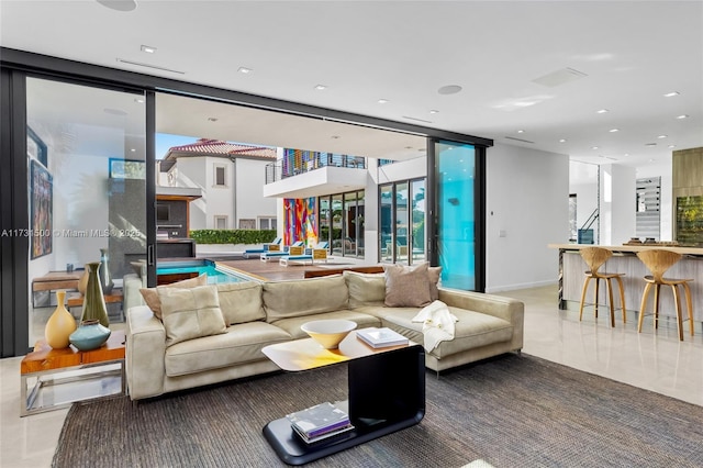 living room with a wall of windows